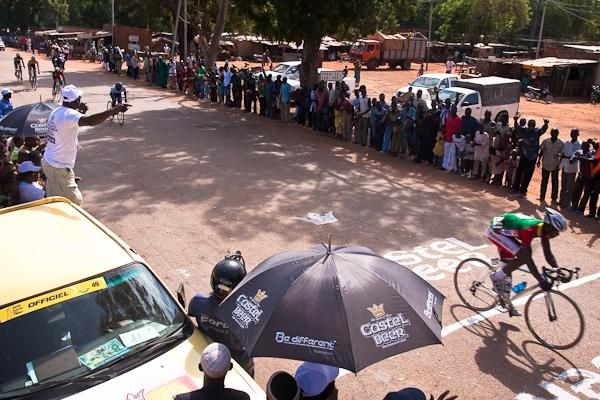 A Burkina rider wins the first intermediate sprint of Stage 6.