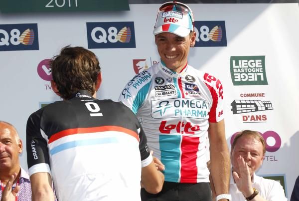 Fr&auml;nk Schleck (Leopard Trek) congratulates Philippe Gilbert (Omega Pharma-Lotto) on the podium.