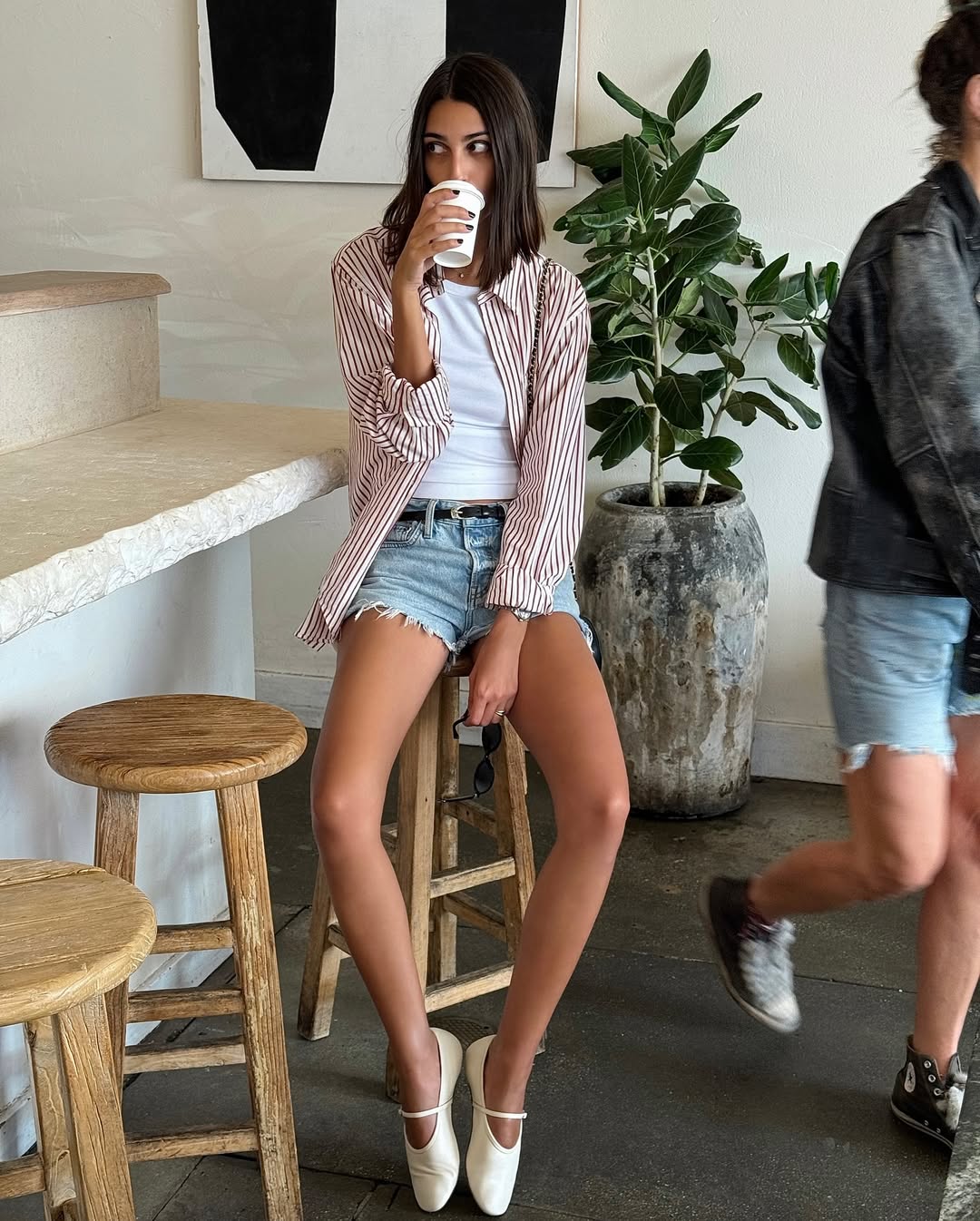 Salom&amp;eacute; Mory in denim shorts and ballet flats