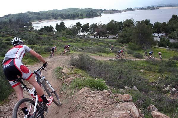 The back of the men's field takes on the descent.