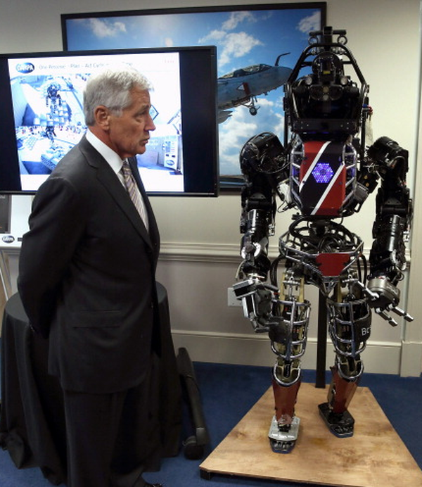 Chuck Hagel meets-and-greets with 6-foot-tall, 330-pound Terminator-like robot