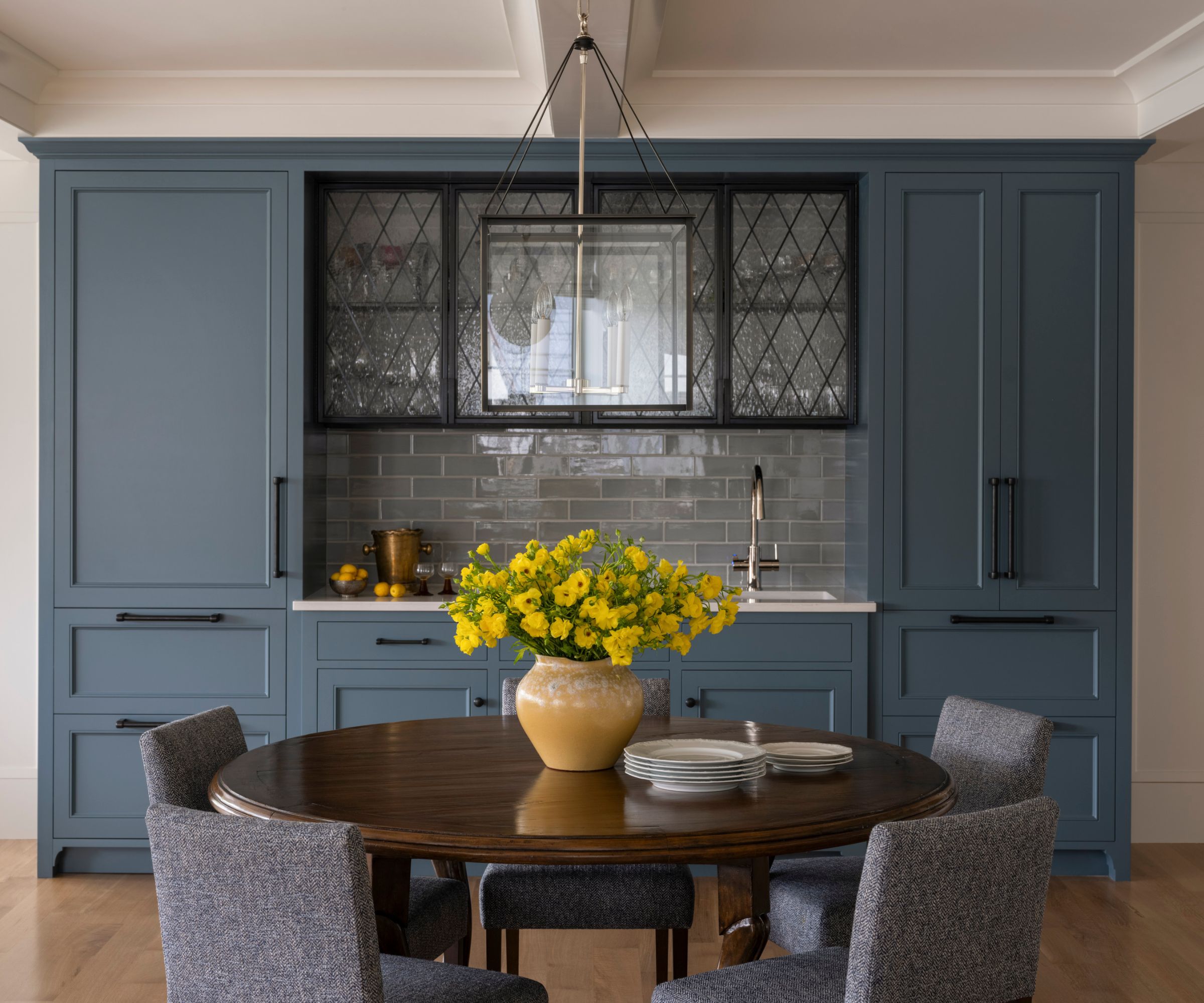 round dining table and home bar space