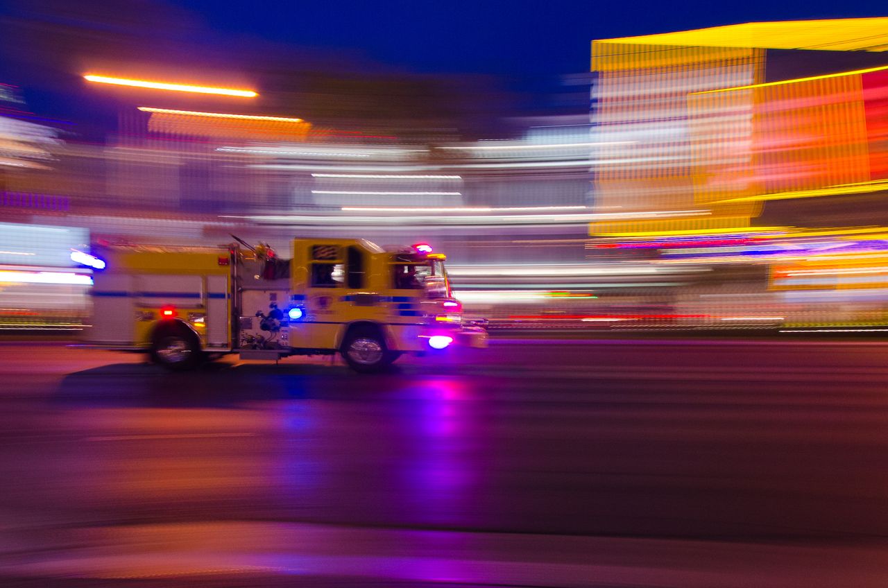 A fire truck rushes to a fire