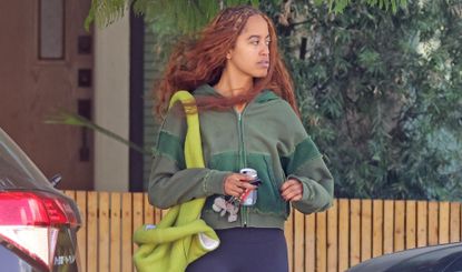 Malia Obama leaving brunch with a brat green bag