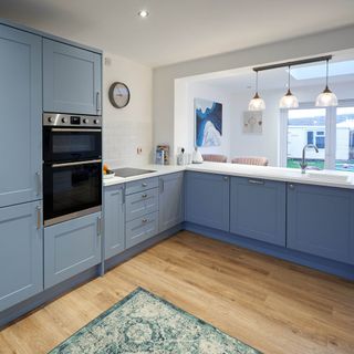 kitchen room with blue kitchen cabinets