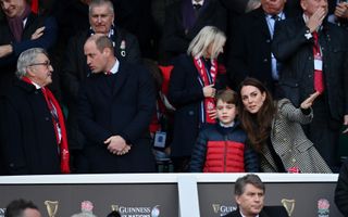 Catherine, Duchess of Cambridge speaks to her son Prince George of Cambridge prior to the Six Nations Rugby match between England and Wales