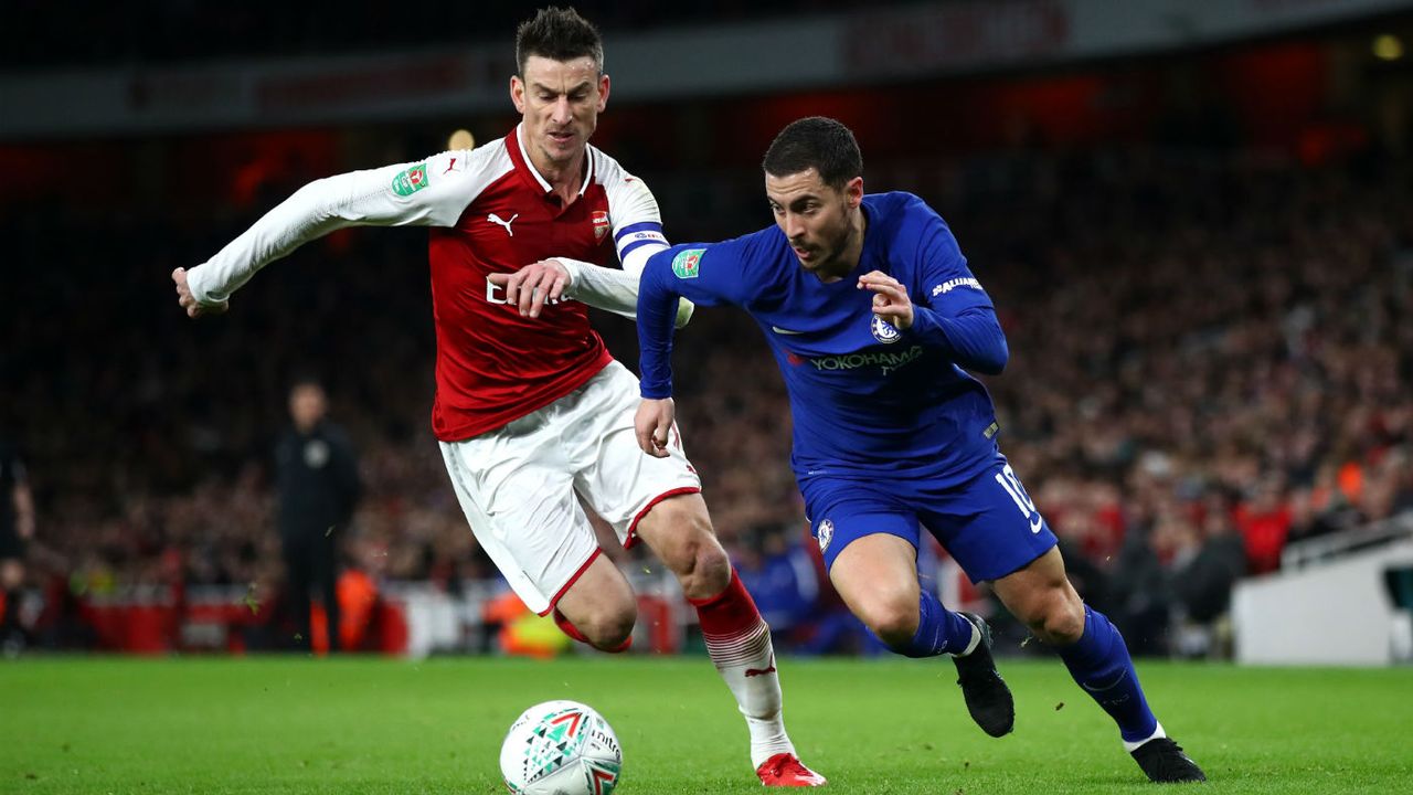 Chelsea forward Eden Hazard in action against Arsenal defender Laurent Koscielny 