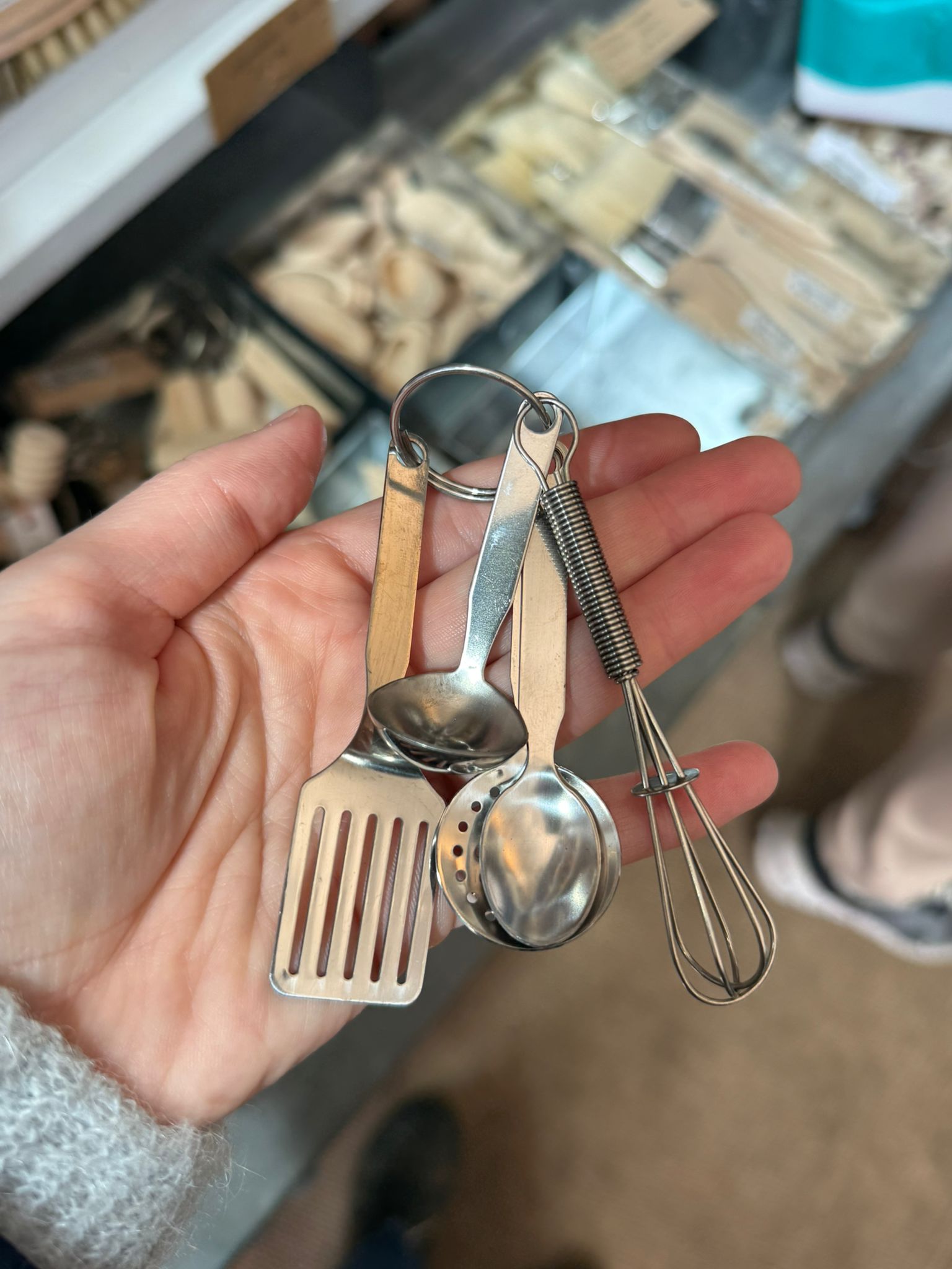 Tiny kitchen utensils on a keyring