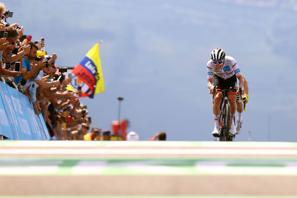 PEYRAGUDES FRANCE JULY 20 Tadej Pogacar of Slovenia and UAE Team Emirates White Best Young Rider Jersey and Jonas Vingegaard Rasmussen of Denmark and Team Jumbo Visma Yellow Leader Jersey sprint at finish line during the 109th Tour de France 2022 Stage 17 a 1297km stage from SaintGaudens to Peyragudes 1580m TDF2022 WorldTour on July 20 2022 in Peyragudes France Photo by Michael SteeleGetty Images