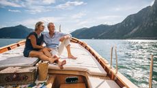 A senior couple on a boat.