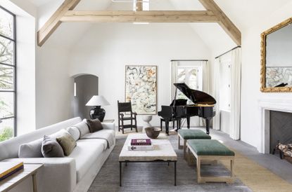 how do you use two rugs in a living room, white living room with statement art by Marie Flanigan Interiors