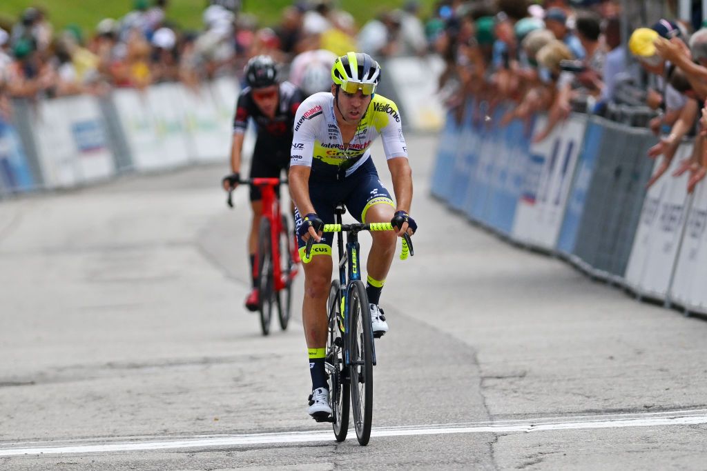LLEX MONTSJURA FRANCE AUGUST 02 Lilian Calmejane of France and Team IntermarchCircusWanty crosses the finish line during the 35th Tour de lAin 2023 Stage 3 a 137km stage from Oyonnax to Llex MontsJura 898m on August 02 2023 in Llex MontsJura France Photo by Luc ClaessenGetty Images