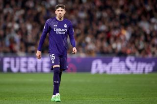 Liverpool target Federico Valverde of Real Madrid looks on during the LaLiga EA Sports match between Real Madrid CF and Athletic Bilbao at Estadio Santiago Bernabeu on March 31, 2024 in Madrid, Spain. (Photo by Alvaro Medranda/Quality Sport Images/Getty Images)