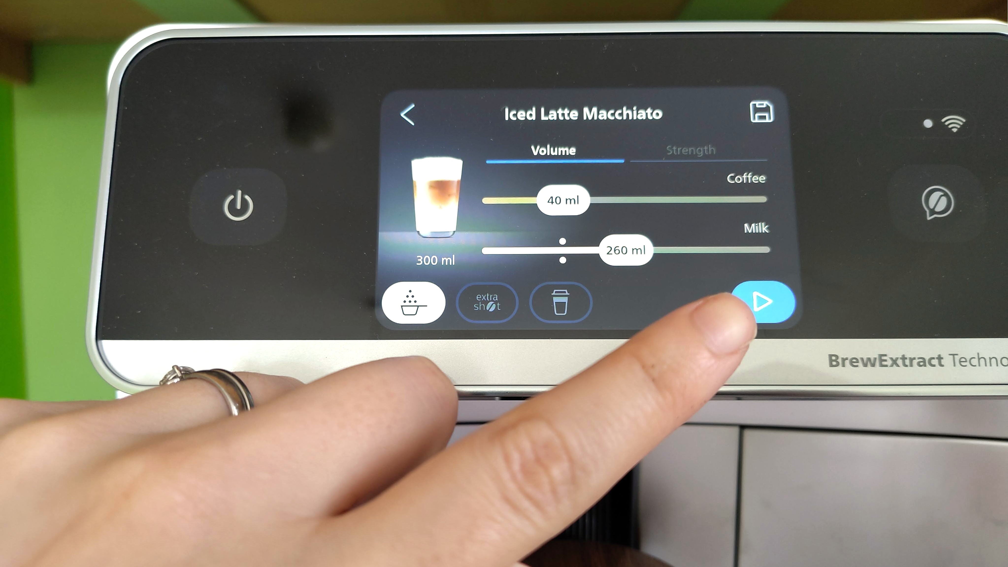 Adjusting brew settings for Philips Cafe Aromis Series 8000 coffee maker using touchscreen