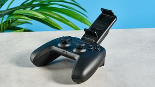 A black SteelSeries Nimbus+ mobile gaming controller for iOS, macOS and iPadOS