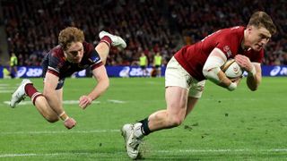Tommy Freeman scores a try for the British & Irish Lions