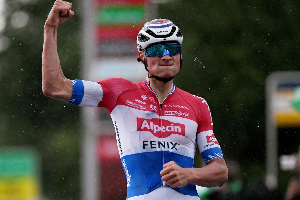 LACHEN SWITZERLAND JUNE 07 Mathieu Van Der Poel of Netherlands and Team AlpecinFenix stage winner celebrates at arrival during the 84th Tour de Suisse 2021 Stage 2 a 178km stage from Neuhausen am Rheinfall to Lachen Rain UCIworldtour tds tourdesuisse on June 07 2021 in Lachen Switzerland Photo by Tim de WaeleGetty Images