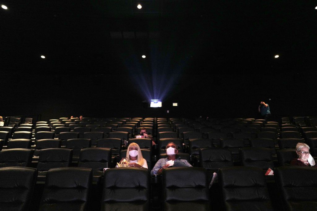 Patrons watch a movie at AMC DINE-IN Thoroughbred 20 on August 20, 2020 in Franklin, Tennessee.