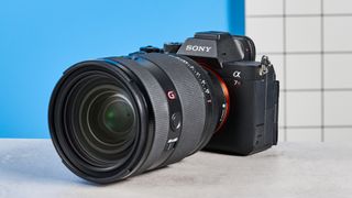The Sony A7RV against a blue background