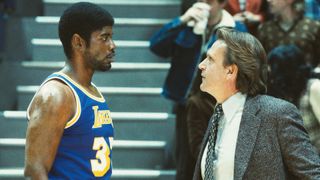 Quincy Isaiah and Jason Segel as Magic Johnson and Paul Westhead in tense moment in Winning Time season 2