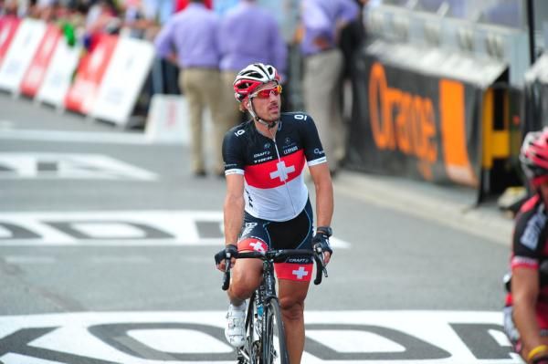 Fabian Cancellara (Leopard Trek) sits up as he crosses the line.