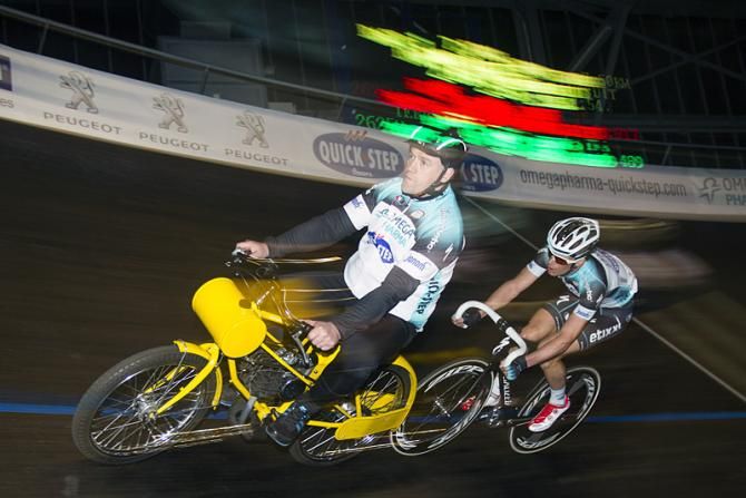 Iljo Keisse shows off his considerable derny racing talent during the Omega Pharma-Quick Step team presentation