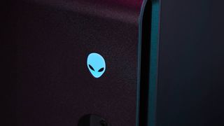 Closeup of R16 Alienware badge with blue LED backlighting