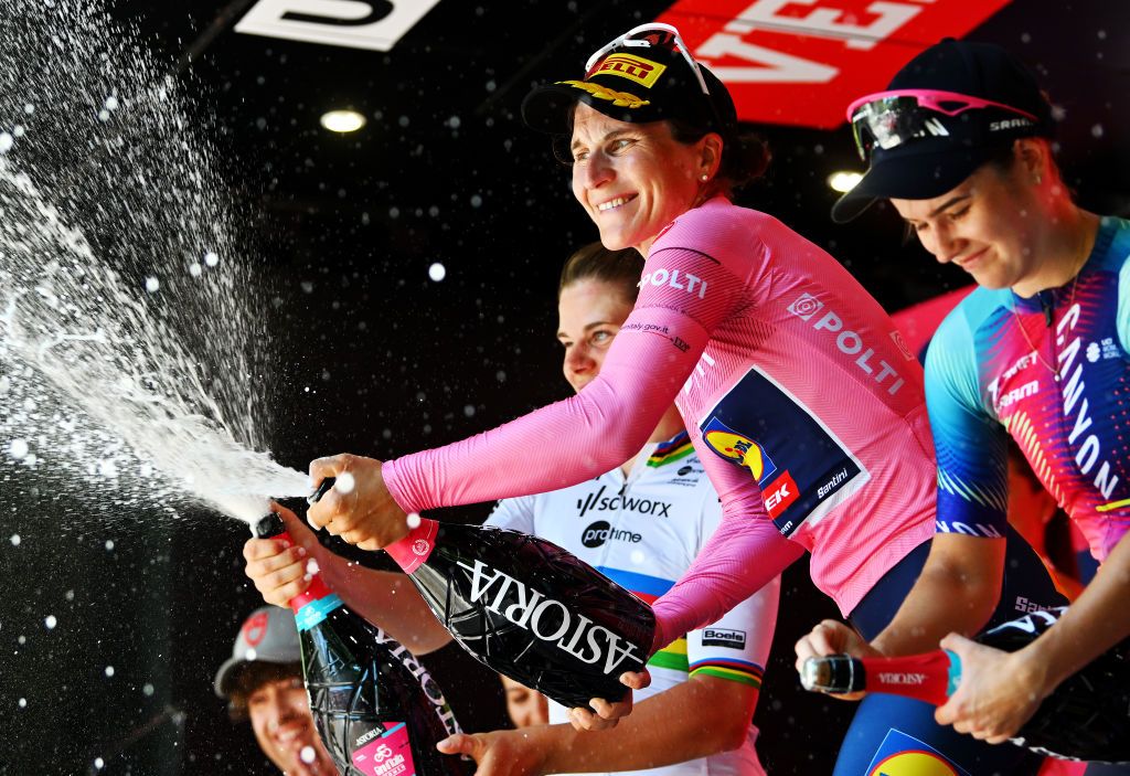 LAQUILA ITALY JULY 14 LR Lotte Kopecky of Belgium and Team SD Worx Protime on second place race winner Elisa Longo Borghini of Italy and Team Lidl Trek Pink Leader Jersey and Neve Bradbury of Australia and Team CanyonSRAM Racing on third place pose on the podium ceremony after the 35th Giro dItalia Women 2024 Stage 8 a 117km stage from Pescara to LAquila UCIWWT on July 14 2024 in LAquila Italy Photo by Luc ClaessenGetty Images
