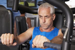 A man works out with weights.