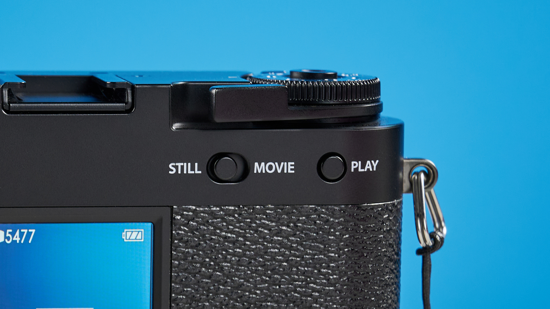 A black Fujifilm X half camera