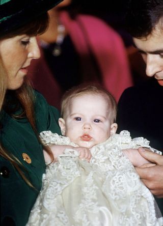 Sarah Ferguson with Princess Beatrice at her christening