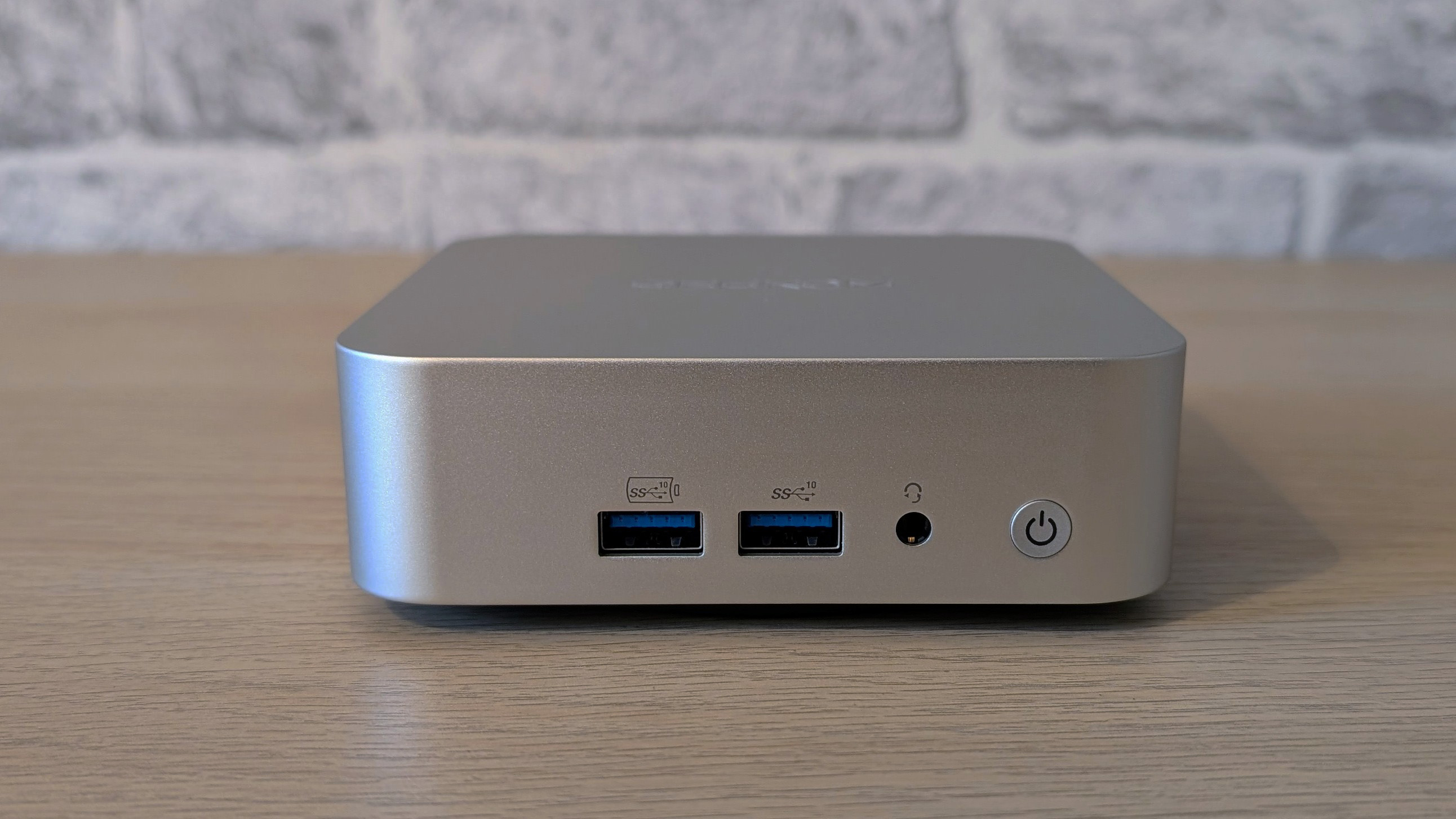 The Geekom A8 AI mini PC on a desk