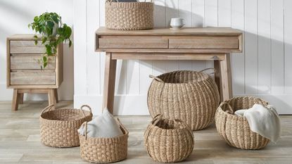 A selection of woven wicker baskets in an entrway