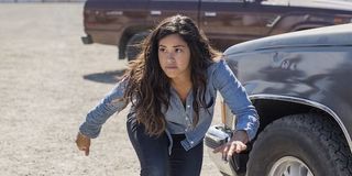 Gina Rodriguez dodging gunfire in Miss Bala