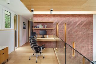 brick wall with mezzanine home office