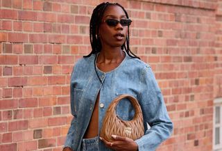 Woman wearing double denim scandi fall fashion trend.