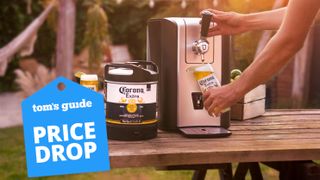 PerfectDraft Machine at-home beer dispenser out in the back yard with a man pouring a glass of Corona beer