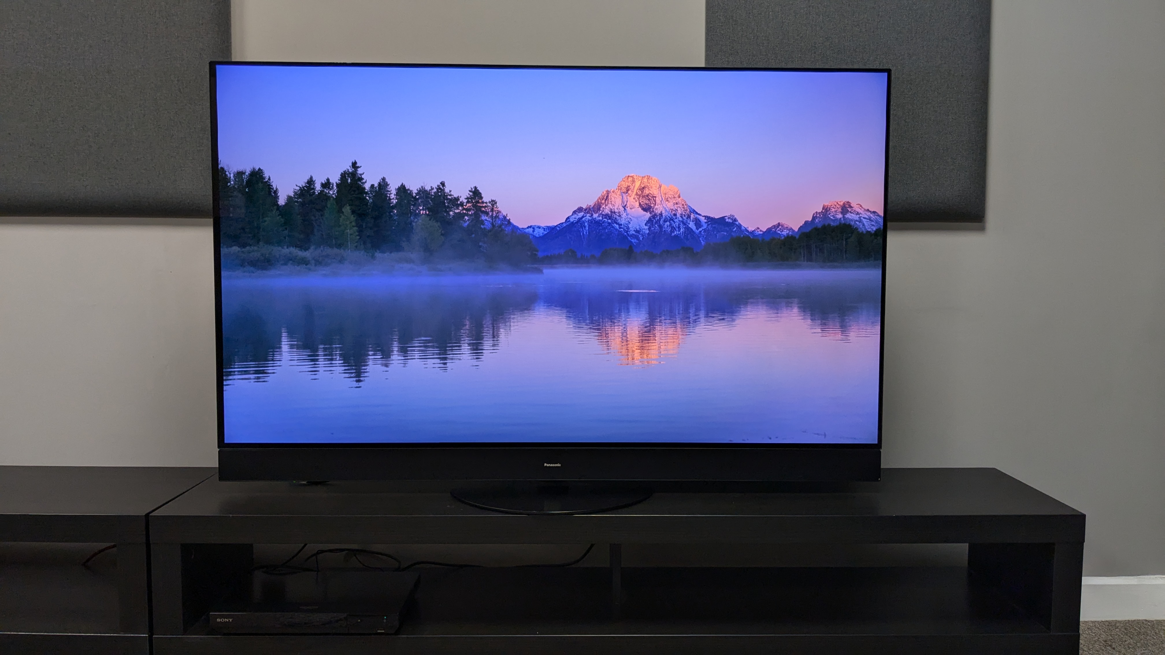 Sony UBP-X700 with sunset on screen of Panasonic MZ1500