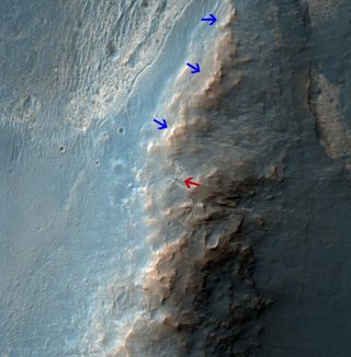 The Mars rover Opportunity drives over Murray Ridge.