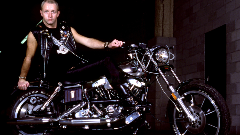 Rob Halford of Judas Priest on a motorbike in 1982