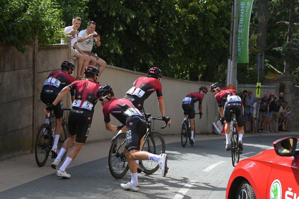 Geraint Thomas gets up after a crash