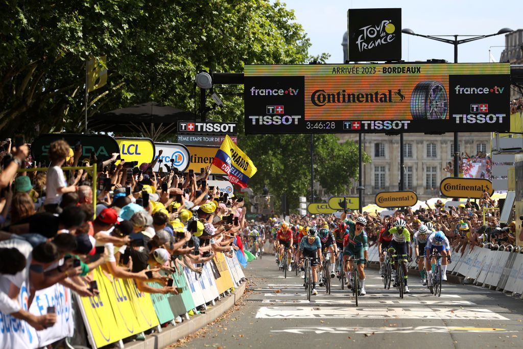 BORDEAUX FRANCE JULY 07 A general view of Jasper Philipsen of Belgium and Team AlpecinDeceuninck Green points jersey celebrates at finish line as stage winner ahead of Mark Cavendish of United Kingdom and Astana Qazaqstan Team Biniam Girmay of Eritrea and Team IntermarchCircusWanty Dylan Groenewegen of The Netherlands and Team JaycoAlUla Jordi Meeus of Belgium and Team BORAHansgrohe Phil Bauhaus of Germany and Team Bahrain Victorious Mads Pedersen of Denmark and Team LidlTrek during the stage seven of the 110th Tour de France 2023 a 1699km stage from Mont de Marsan to Bordeaux UCIWT on July 07 2023 in Bordeaux France Photo by Michael SteeleGetty Images