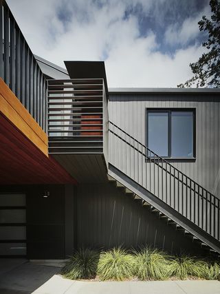 external staircase and detail of facade at Mill Valley house Courtyard house