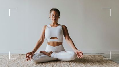 Woman sitting upright while doing yoga