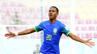 Manchester United target Messinho of Brazil celebrates scoring the opening goal during the FIFA U-17 World Cup Round 16 match between Ecuador and Brazil at Manahan Stadium on November 20, 2023 in Surakarta, Indonesia. (Photo by Masashi Hara - FIFA/FIFA via Getty Images)