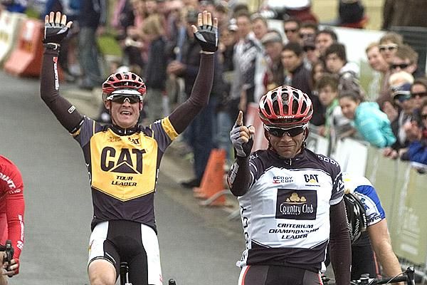 Numero uno on both the stage and the Tour: Jonathan Cantwell signals his ranking as Fly V Australia teammate and Tour winner Bernard Sulzberger begins the celebrations behind.