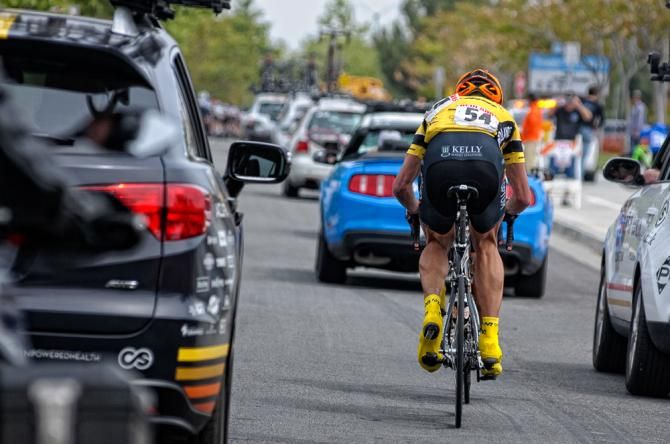 Tom Zirbel (Team Optum p/b Kelly Benefit Strategies) chases back on after a flat in the closing kilometers