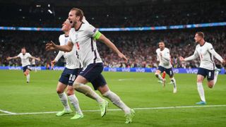 England captain Harry Kane celebrates his winning goal against Denmark