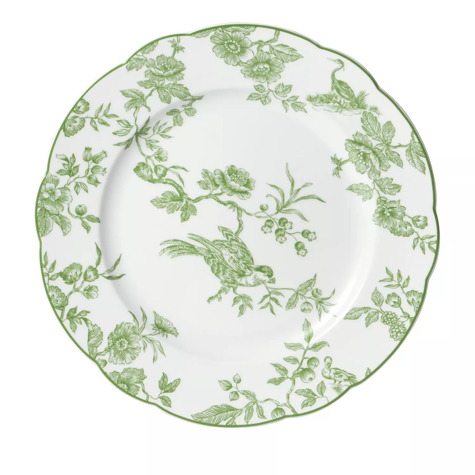 White scalloped plate with green floral design