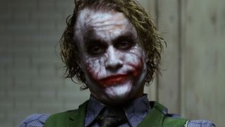 The Joker (Heath Ledger) speaks to Batman in The Dark Knight.